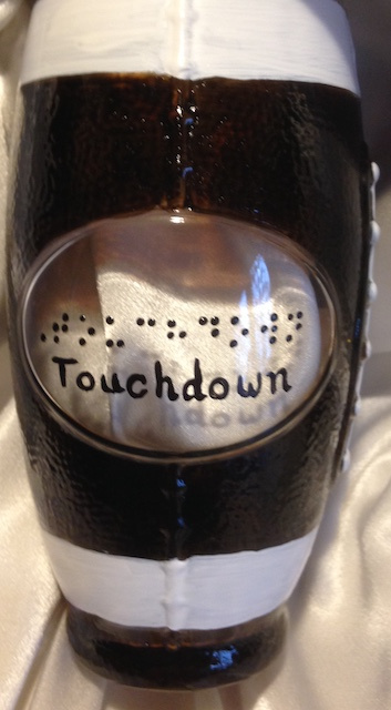 Touchdown! Football shaped glass with raised-dot Braille