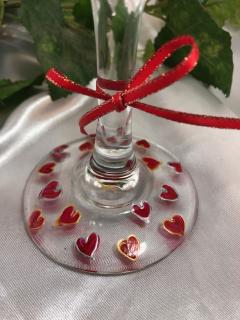 Base of glass with hand painted red hearts - outlined in raised gold and sliver