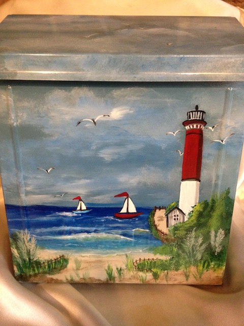 Wall mounted mailbox with ocean scene and lighthouse