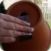 Sanding terra cotta pots