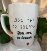 White ceramic mug (14oz.) with adorable red hearts, raised dot braille You are so loved